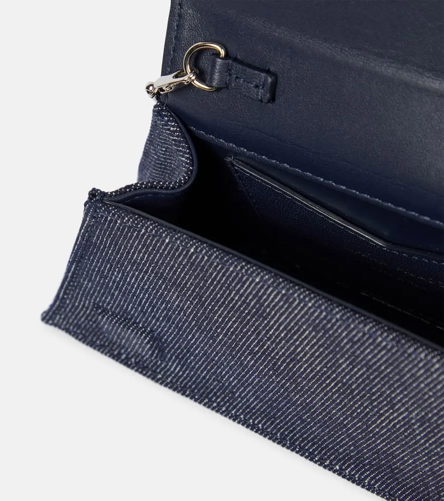 Amina Muaddi Superamini Yigit denim clutch
